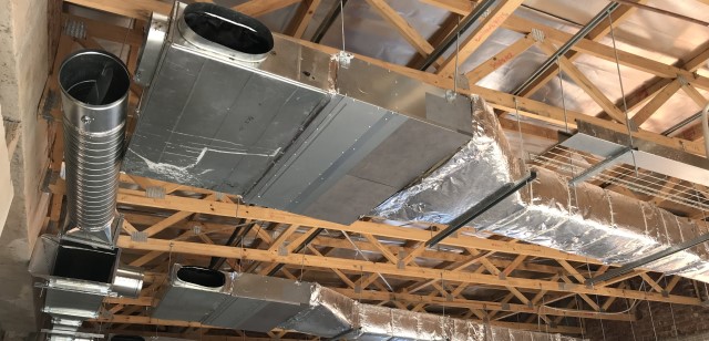 Ducted hide-away air conditioners